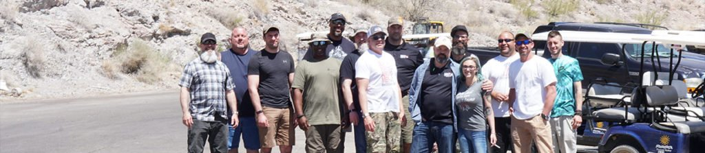 Centurion Club members group photo in the Arizona desert